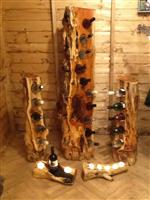 Gallery Wine Racks and natural log candle holders and single wine holder.jpg